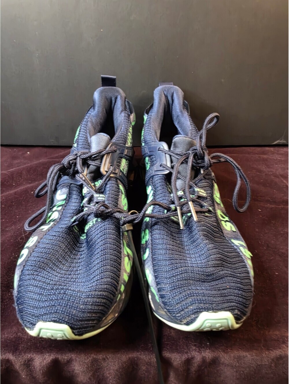 Black and Green Athletic Sneakers with Unique Sole Design